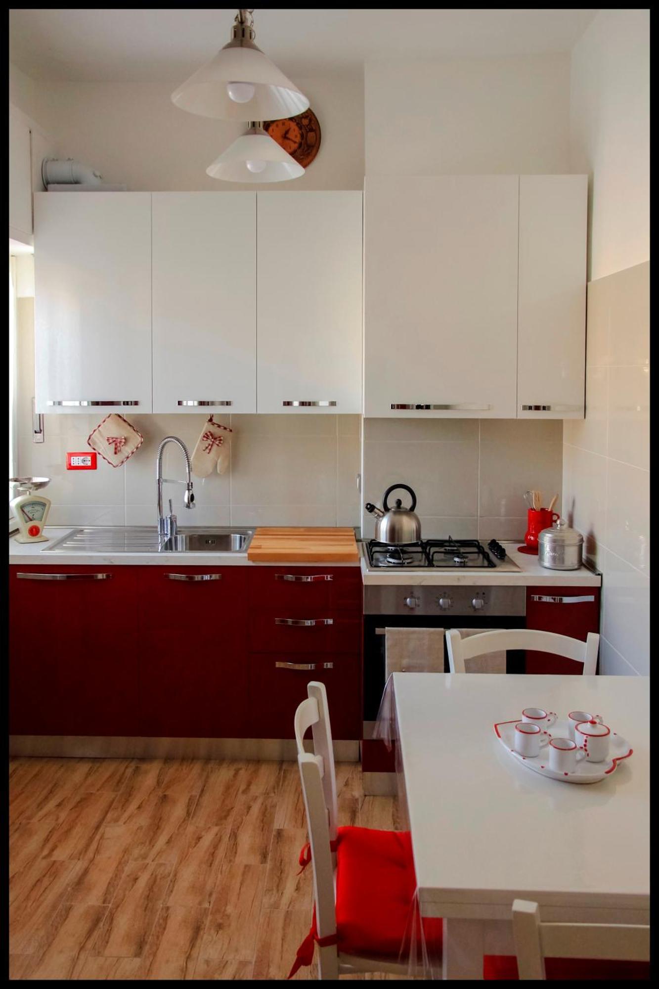 Domus Vacanze - Qui Staremo Bene Apartment